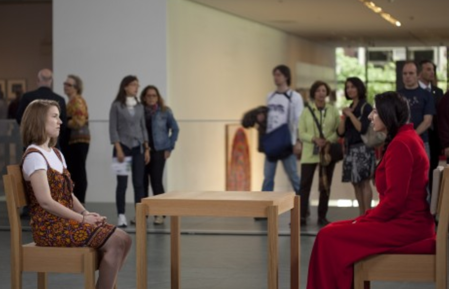 Marina Abramović sitting at MoMa